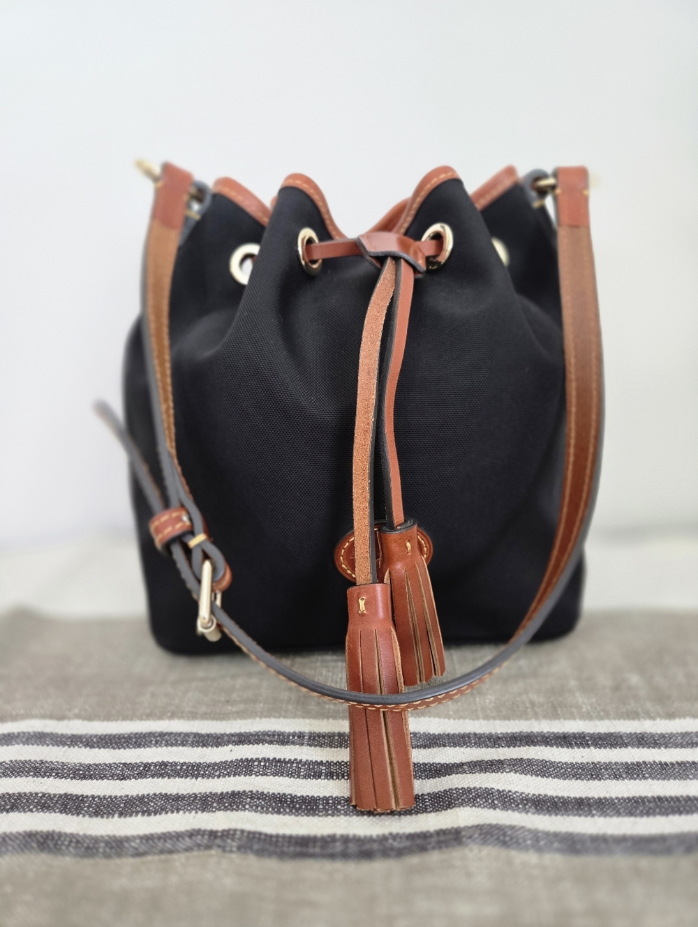 Dooney & Bourke Black Nylon Bucket Bag with Brown Trim and Tassels - Picture 5 of 16
